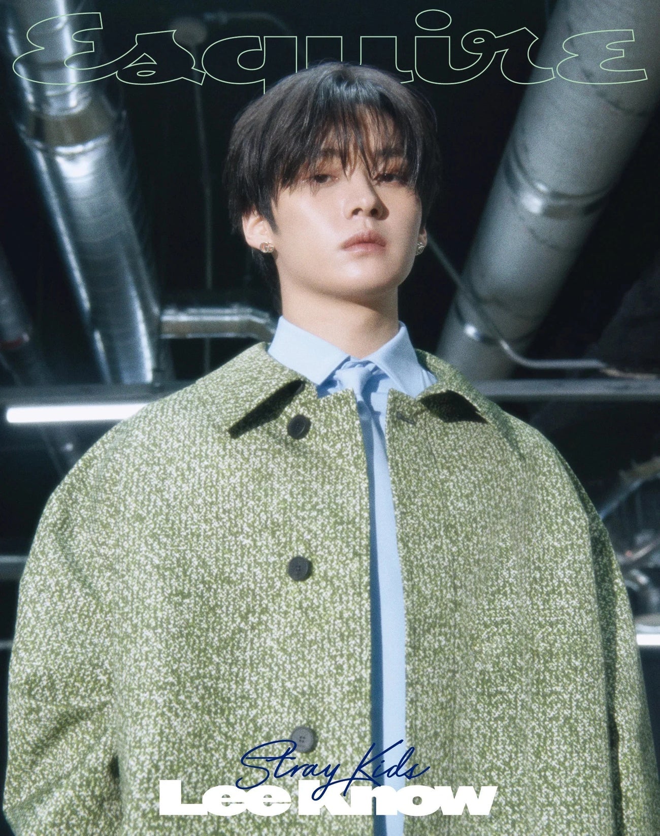 Lee know stray kids on the cover of esquire magazine with green jacket